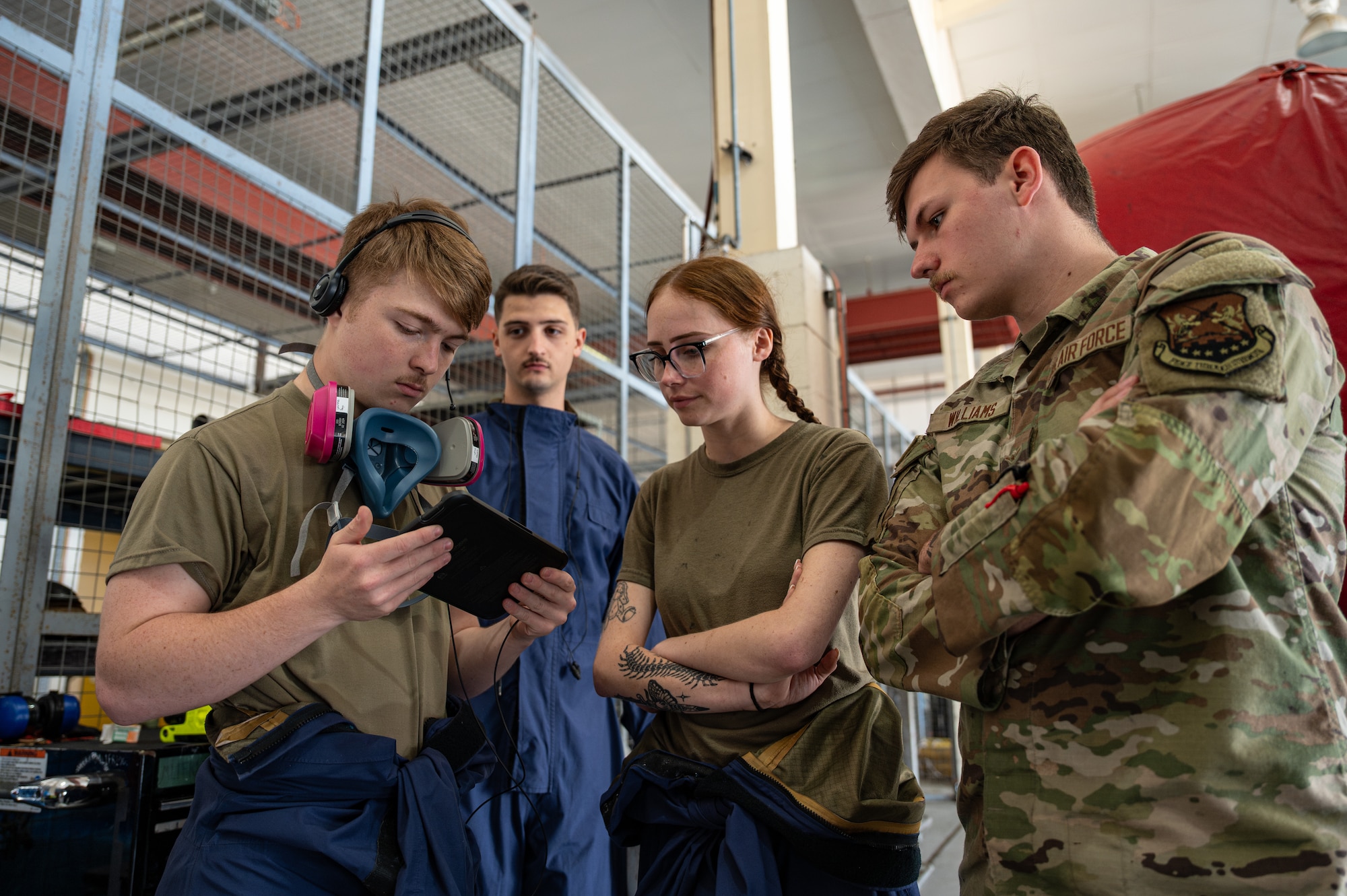 Airmen assigned to the 100th Maintenance Squadron prepare to use the Integrated Respirator Information System (IRIS) during a demonstration at RAF Mildenhall, England, Sept. 2, 2025.