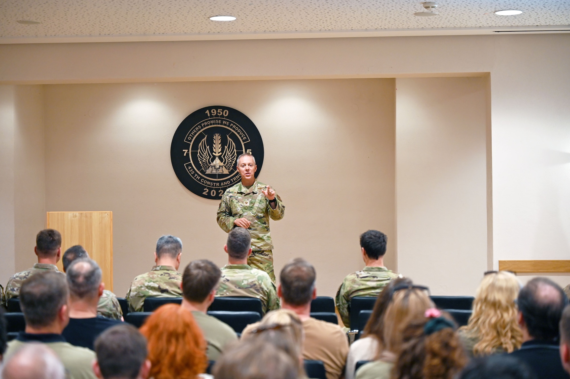 Col. Damon Field, 435th Contingency Response Group commander, speaks during the 75th anniversary celebration of the 435th Construction and Training Squadron, Sept. 19, 2025.  The ceremony highlighted the squadrons’ unique history and mission set. (U.S. Air Force photo by Capt. Lou Burton)