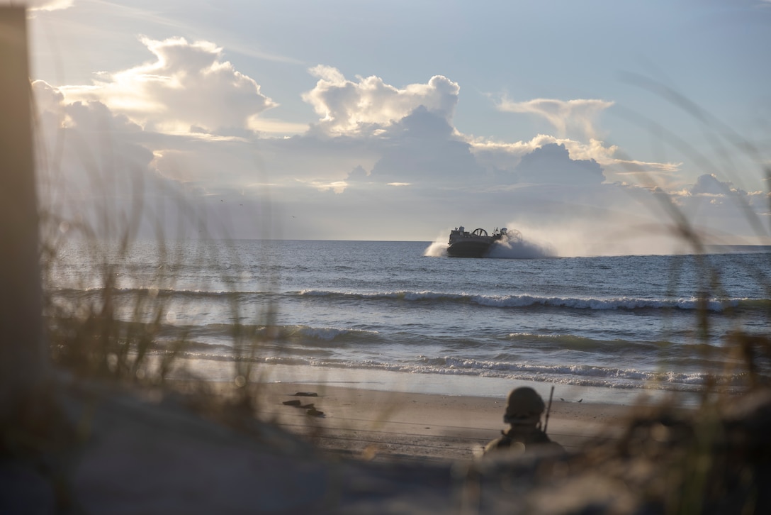 A U.S. Navy landing craft, air cushion assigned to Assault Craft Unit 4 arrives at Onslow Beach during exercise UNITAS 2025 at Marine Corps Base Camp Lejeune, North Carolina, Sept. 25, 2025. UNITAS, Latin for “unity,” was conceived in 1959 and has taken place annually since 1960. This year marks the 66th iteration of the world’s longest-running multinational maritime exercise. (U.S. Marine Corps photo by Lance Cpl. Payton Goodrich)