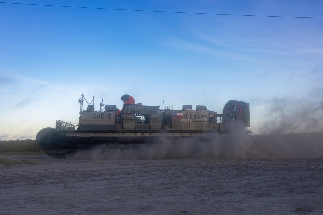 A U.S. Navy Landing Craft, Air Cushion 2 assigned to Assault Craft Unit 4 departs from Onslow Beach during exercise UNITAS 2025 at Marine Corps Base Camp Lejeune, North Carolina, Sept. 25, 2025. UNITAS, Latin for “unity,” was conceived in 1959 and has taken place annually since 1960. This year marks the 66th iteration of the world’s longest-running multinational maritime exercise. (U.S. Marine Corps photo by Lance Cpl. Payton Goodrich)