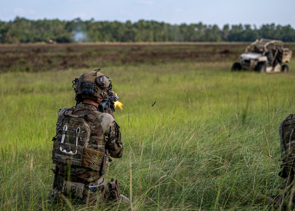 A U.S. Air Force Airman assigned to the 823rd Base Defense Squadron shoots blanks at the simulated opposing force at Moody Air Force Base, Georgia, Sept. 18, 2025. The training was one of many scenarios accomplished during Exercise Prepared Jester, a 10-day training event, which tested the squadron’s ability to plan and execute the mission of securing and defending a contingency location. (U.S. Air Force photo by Senior Airman Leonid Soubbotine)