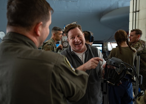 Chris McLennan, chief technology officer, showcases the mask portion of the Integrated Respirator Information System during a demonstration at RAF Mildenhall, England, Sept. 2, 2025.