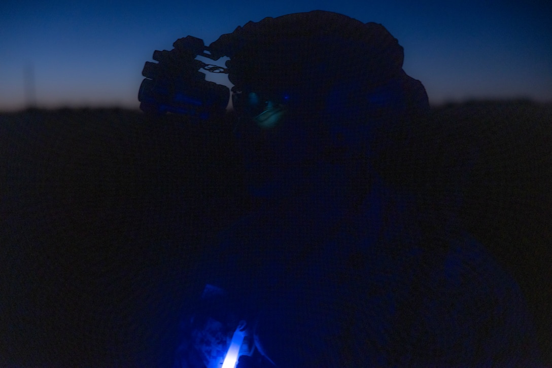 U.S. Marine Corps Gunnery Sgt. Jamie Gill, a Marine with 3rd Force Reconnaissance Company, 4th Marine Division, watches as Marines and partner nation forces participate in a nighttime raid during exercise UNITAS 2025 at Marine Corps Base Camp Lejeune, North Carolina, Sept. 23, 2025. UNITAS, which is Latin for “unity,” was conceived in 1959 and has taken place annually since first conducted in 1960. This year marks the 66th iteration of the world’s longest running annual multinational maritime exercise. (U.S. Marine Corps photo by Lance Cpl. Payton Goodrich)