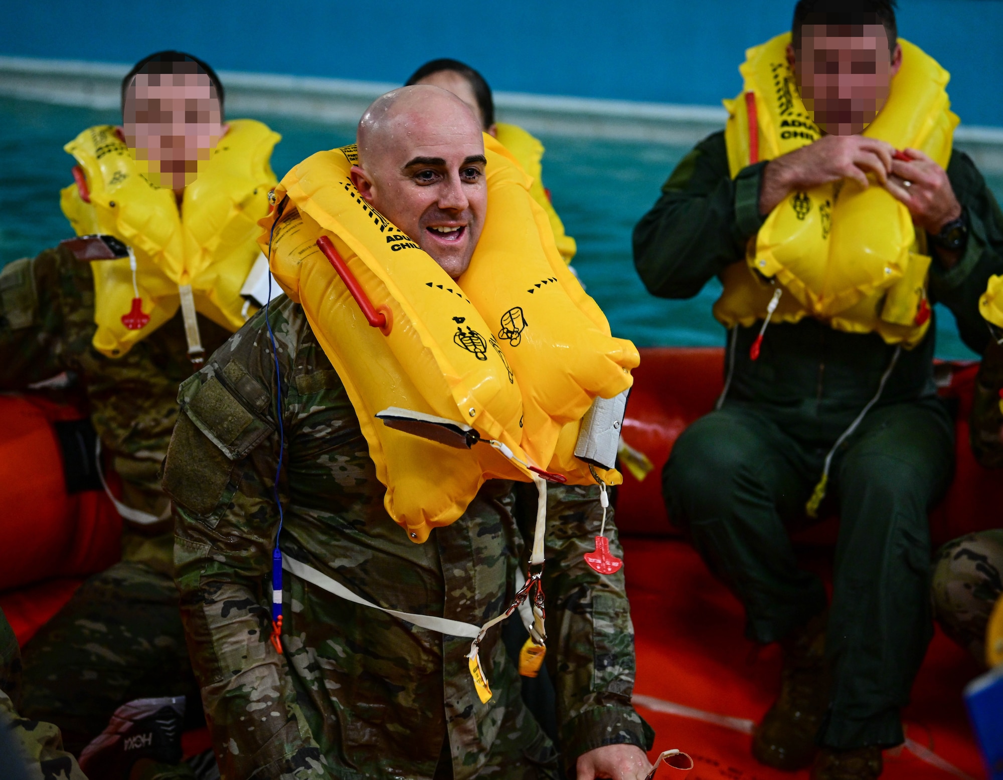 U.S. Air Force Chief Master Sgt. James Wall, 100th Air Refueling Wing command chief, smiles during the Survival, Evasion, Resistance, and Escape course at the East Coast Environmental Pool, Lowestoft, United Kingdom, Sept. 12, 2025.