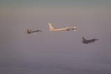 F-16 escorts Russian military aircraft