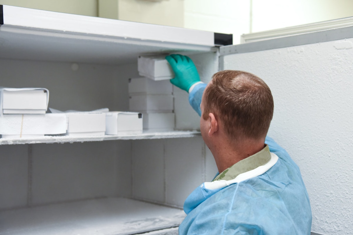Image of an Airman working with samples.