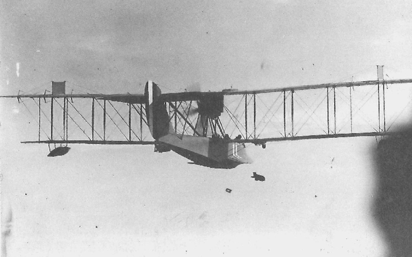 One of Chatham Air Station’s HS-1 flying boats dropping its payload of two wing-mounted bombs. (Courtesy of the National Archives)