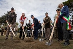 Oklahoma National Guard members and veterans and Italian representatives break ground at a future memorial site to honor the 45th Infantry Division in Paestum, Italy, Sept. 9, 2025. A delegation of Oklahoma National Guard members and veterans toured key locations from the 45th Infantry Division’s campaign in Italy against German forces during World War II, continuing the development of the Thunderbird Trail. The initiative is aimed at preserving the Division's role in World War II through a memorial trail tracing its footsteps through Italy, France and Germany, ensuring their sacrifices are never forgotten. (U.S. Army photo by Sgt. Danielle Rayon)
