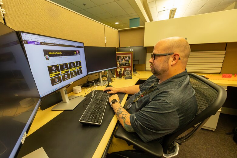 Man working at desk.