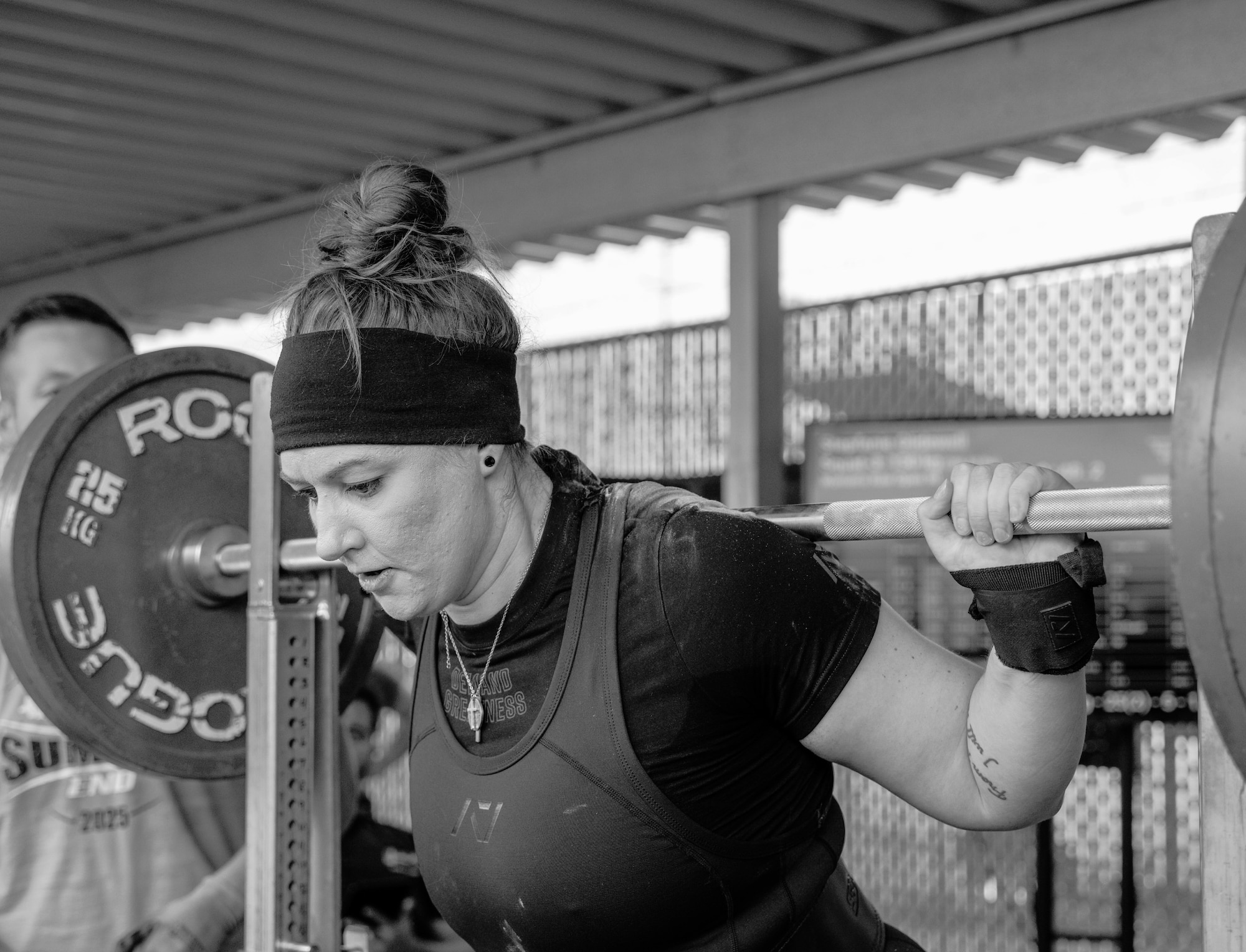U.S. Air Force Master Sgt. Stepfanie Glidewell prepares to perform a back squat on August 30, 2025 in Vancouver, Washington for the Summer’s End powerlifting competition. Glidewell would go on to place first in her weight class for the event.