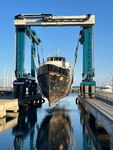 The 108-foot vessel Cairdeas is pictured following its sinking in Bremerton Marina, Sept. 14, 2025. A unified command led by the Coast Guard, Washington Department of Ecology, and Washington Department of Natural Resources oversaw the response, during which about 1,200 gallons of diesel spilled and containment boom was deployed before the vessel was raised and removed to Port Townsend. (U.S. Coast Guard courtesy photo)
