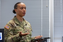 Capt. Kali Rose, 125th Finance Battalion disbursing officer, delivers her portion of a capstone project as part of the U.S. Army Financial Management Command’s Operational Banking Short Course at the Maj. Gen. Emmett J. Bean Federal Center in Indianapolis Sept. 12, 2025. Upon graduation of the OBSC, Soldiers can advise commanders on establishing financial institutions and ATMs on Army installations, evaluate foreign financial institutions for establishing limited depositary accounts, and provide banking infrastructure evaluations as part of an economic analysis. (U.S. Army photo by Mark R. W. Orders-Woempner)
