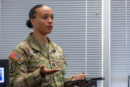 Capt. Kali Rose, 125th Finance Battalion disbursing officer, delivers her portion of a capstone project as part of the U.S. Army Financial Management Command’s Operational Banking Short Course at the Maj. Gen. Emmett J. Bean Federal Center in Indianapolis Sept. 12, 2025. Upon graduation of the OBSC, Soldiers can advise commanders on establishing financial institutions and ATMs on Army installations, evaluate foreign financial institutions for establishing limited depositary accounts, and provide banking infrastructure evaluations as part of an economic analysis. (U.S. Army photo by Mark R. W. Orders-Woempner)