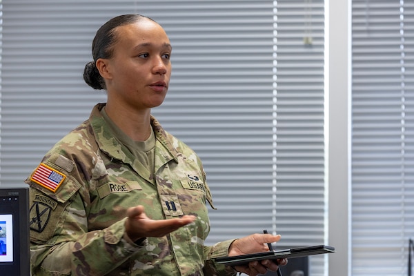 Capt. Kali Rose, 125th Finance Battalion disbursing officer, delivers her portion of a capstone project as part of the U.S. Army Financial Management Command’s Operational Banking Short Course at the Maj. Gen. Emmett J. Bean Federal Center in Indianapolis Sept. 12, 2025. Upon graduation of the OBSC, Soldiers can advise commanders on establishing financial institutions and ATMs on Army installations, evaluate foreign financial institutions for establishing limited depositary accounts, and provide banking infrastructure evaluations as part of an economic analysis. (U.S. Army photo by Mark R. W. Orders-Woempner)