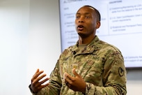 Maj. Terrell Murdock, U.S. Army Financial Management Command executive officer and former Department of the Army banking officer, provides feedback to six students of USAFMCOM’s Operational Banking Short Course at the Maj. Gen. Emmett J. Bean Federal Center in Indianapolis Sept. 12, 2025. Upon graduation of the OBSC, Soldiers can advise commanders on establishing financial institutions and ATMs on Army installations, evaluate foreign financial institutions for establishing limited depositary accounts, and provide banking infrastructure evaluations as part of an economic analysis. (U.S. Army photo by Mark R. W. Orders-Woempner)