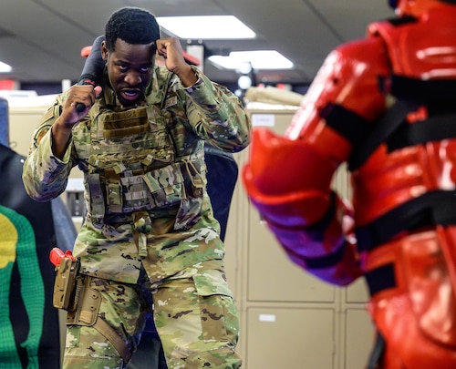 Service member prepares to fight
