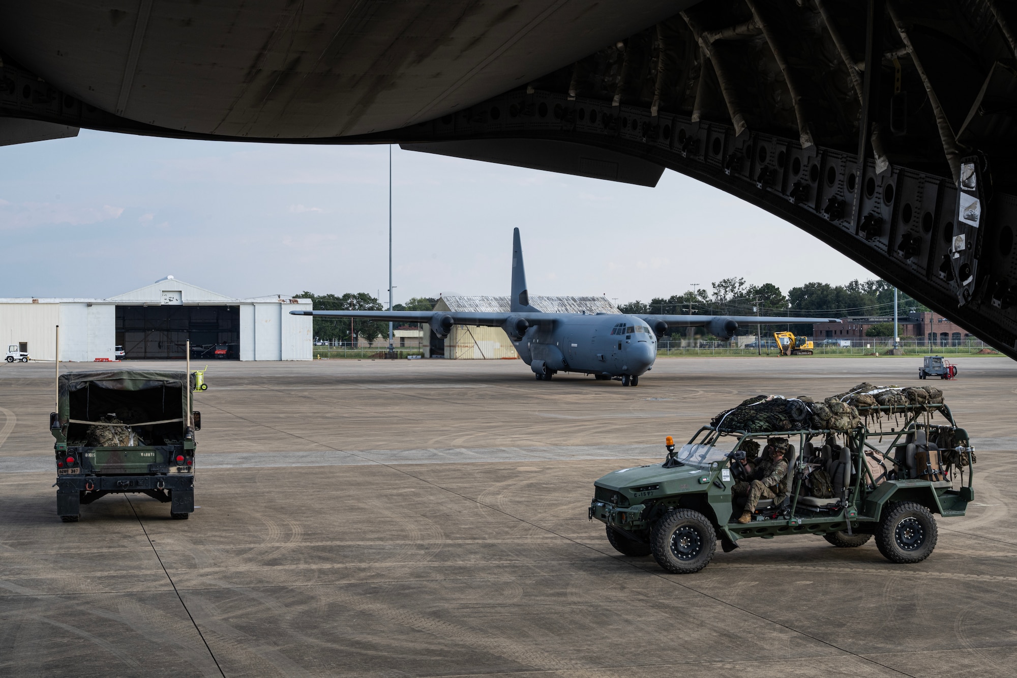 Humvee on a flightline.