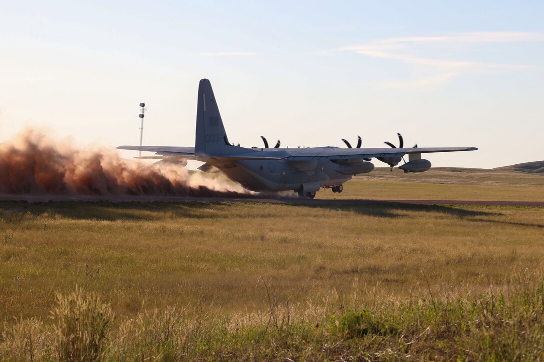 A U.S. Marine Corps KC-130J assigned to Marine Aerial Refueler Transport Squadron 153, Marine Aircraft Group 24, 1st Marine Aircraft Wing, performs touch and go landings on an alternative landing zone during their deployment for training (DFT) at Lt. Gen. Wright Tactical Airfield, Camp Guernsey, Wyoming, July 7, 2025. The DFT enhanced the squadron’s combat readiness by providing pilots and aircrew with essential unit-level training unavailable at their home station. (U.S. Marine Corps photo by Cpl. Anabelle Reed-O’Brien)