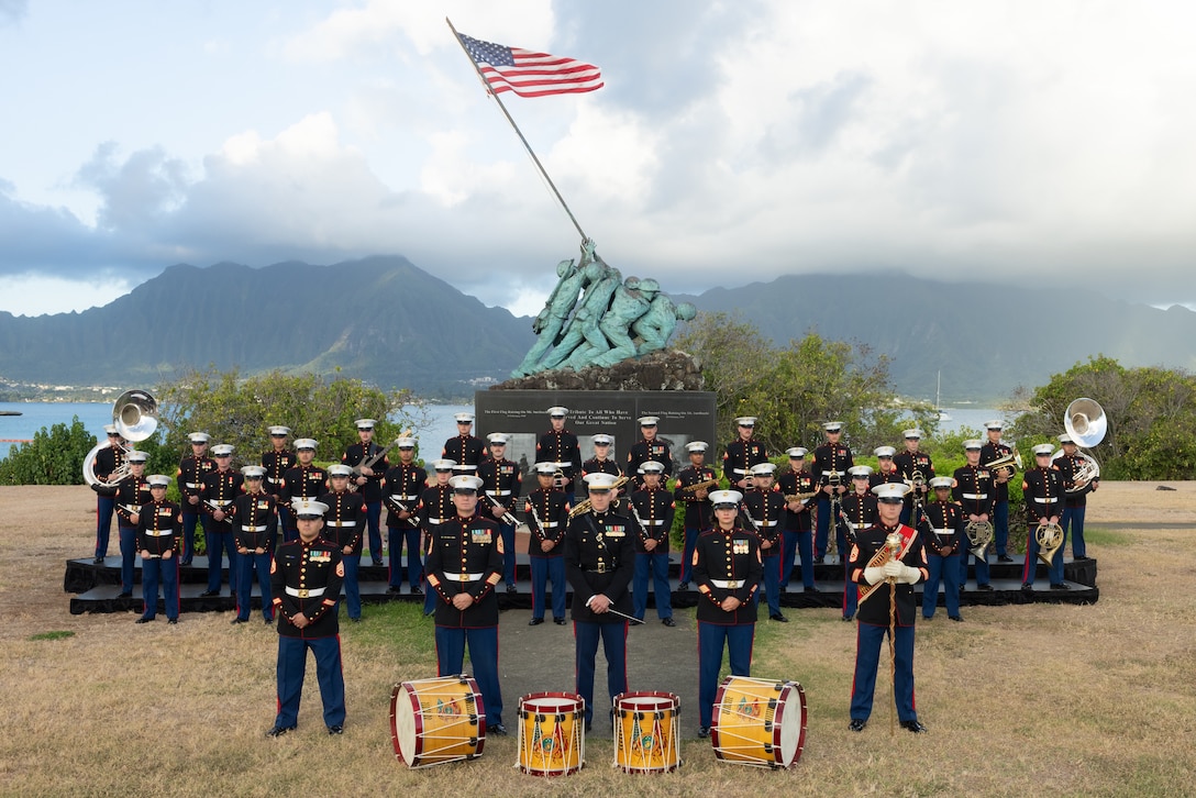 U.S. Marines with the U.S. Marine Corps Forces Pacific Band pose for a unit photo in front of the Iwo Jima Memorial on Marine Corps Base Hawaii, Aug. 25, 2025. The MARFORPAC Band performs throughout the Indo-Pacific at more than 400 events each year, including ceremonies and parades. The band’s primary mission is to provide musical support for military and civic ceremonies. (U.S. Marine Corps photo by Cpl. Conor Ragland)