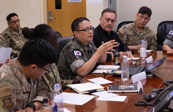Service members and medical professionals from Japan, Republic of Korea, and U.S. forces conduct a blood tabletop exercise in support of Freedom Edge 25.