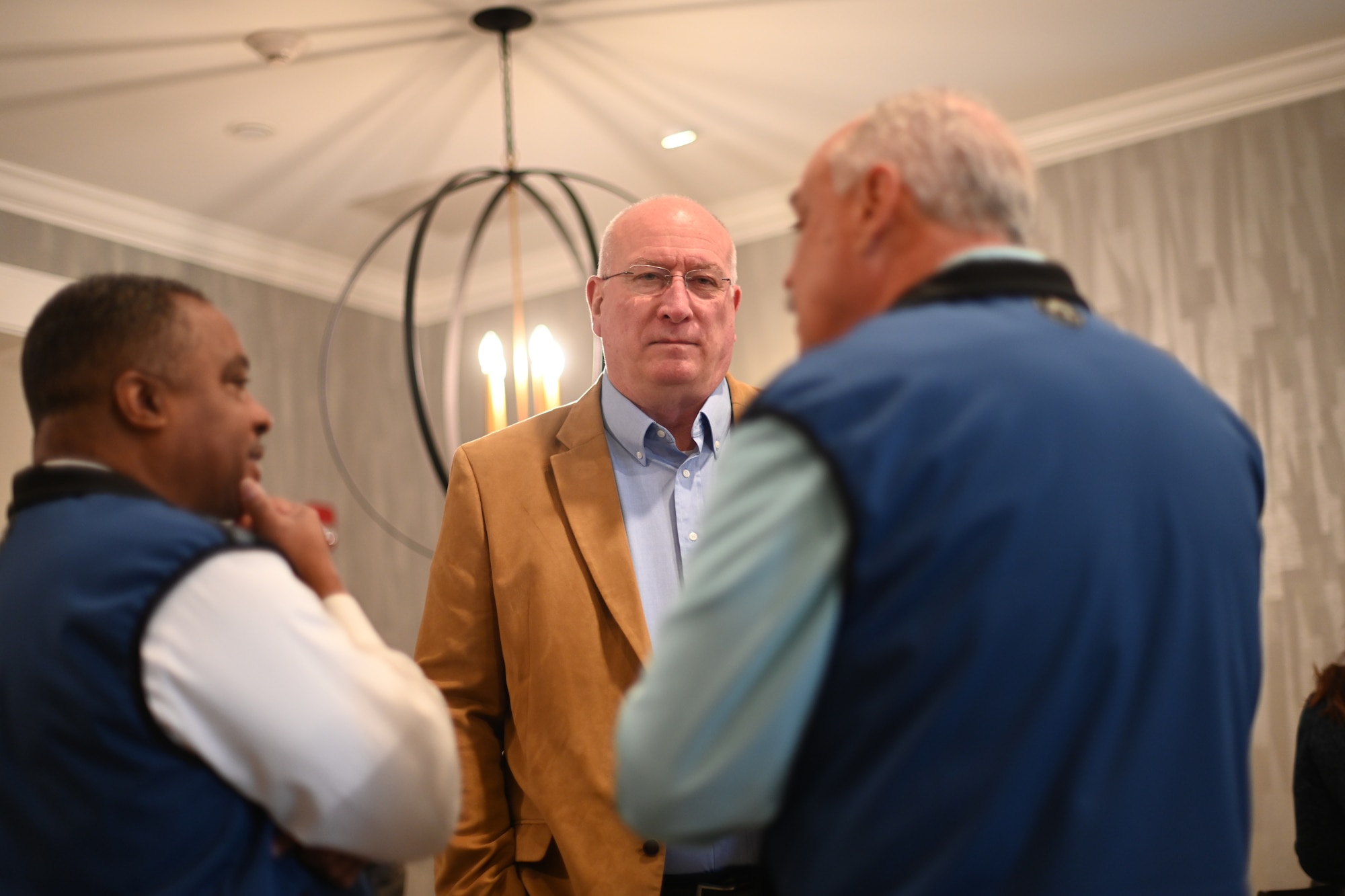 David A. Coker, the president of the Fisher House Foundation, stands with a local news team during the Alaska Fisher House open house on Joint Base Elmendorf-Richardson, Alaska, Sept. 24, 2025. Since the establishment of the first house in 2012, the Alaska Fisher Houses have offered private bedrooms, communal kitchens and living spaces designed to provide a sense of normalcy to families experiencing a medical crisis. (U.S. Air Force photo by Airman 1st Class Eli A. Rose)