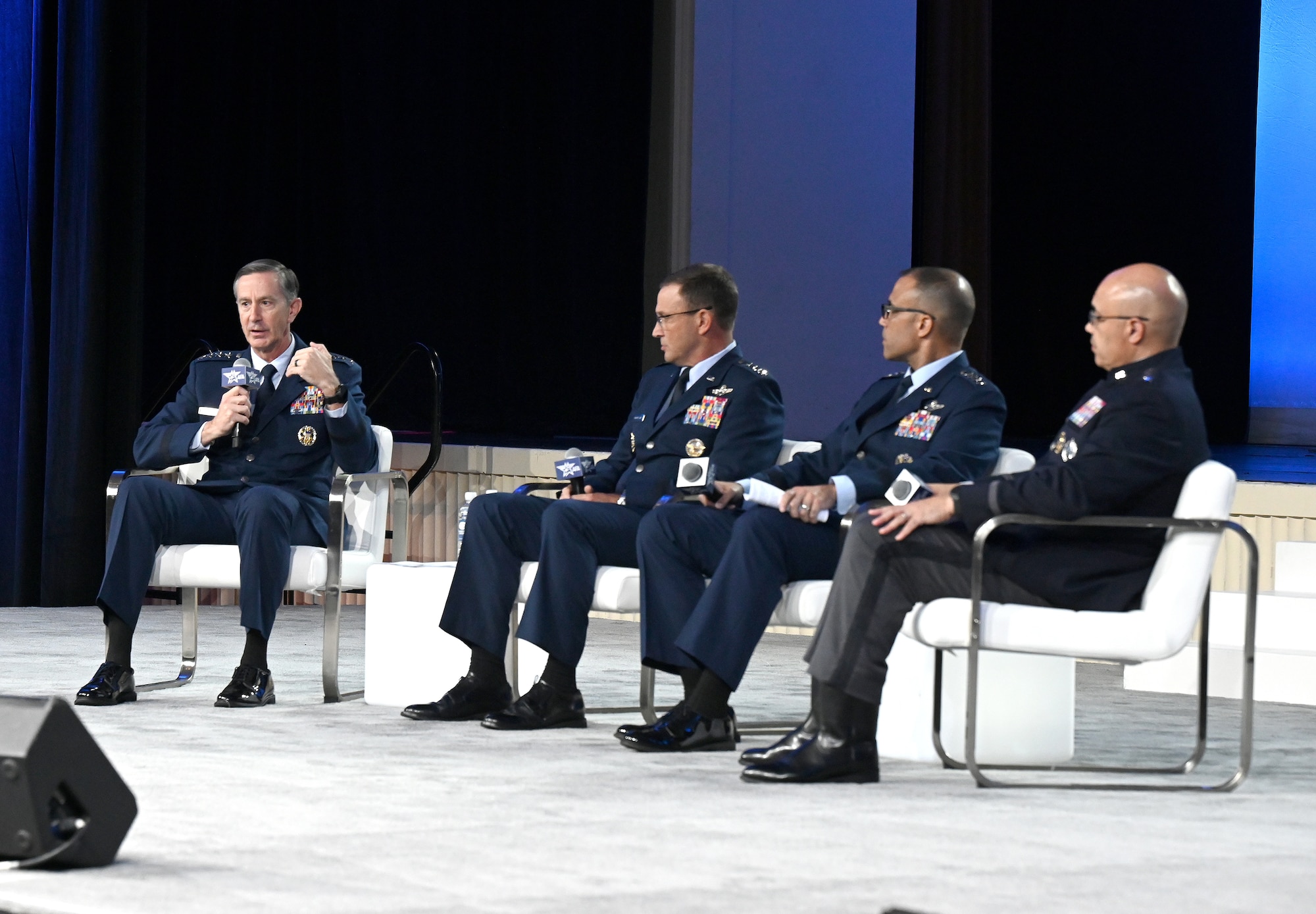 Gen. Kevin Schneider, Gen. Adrian Spain, Gen. John Lamontagne and Lt. Gen. David Miller speaks during the Exercising at Scale panel, at the National Harbor, Md. Sept. 24, 2025.  The Air, Space & Cyber Conference is an opportunity for Department of the Air Force senior leaders to meet and address Airmen, Guardians, allies, partners and industry leaders. (U.S. Air Force photo by Chad Trujillo)