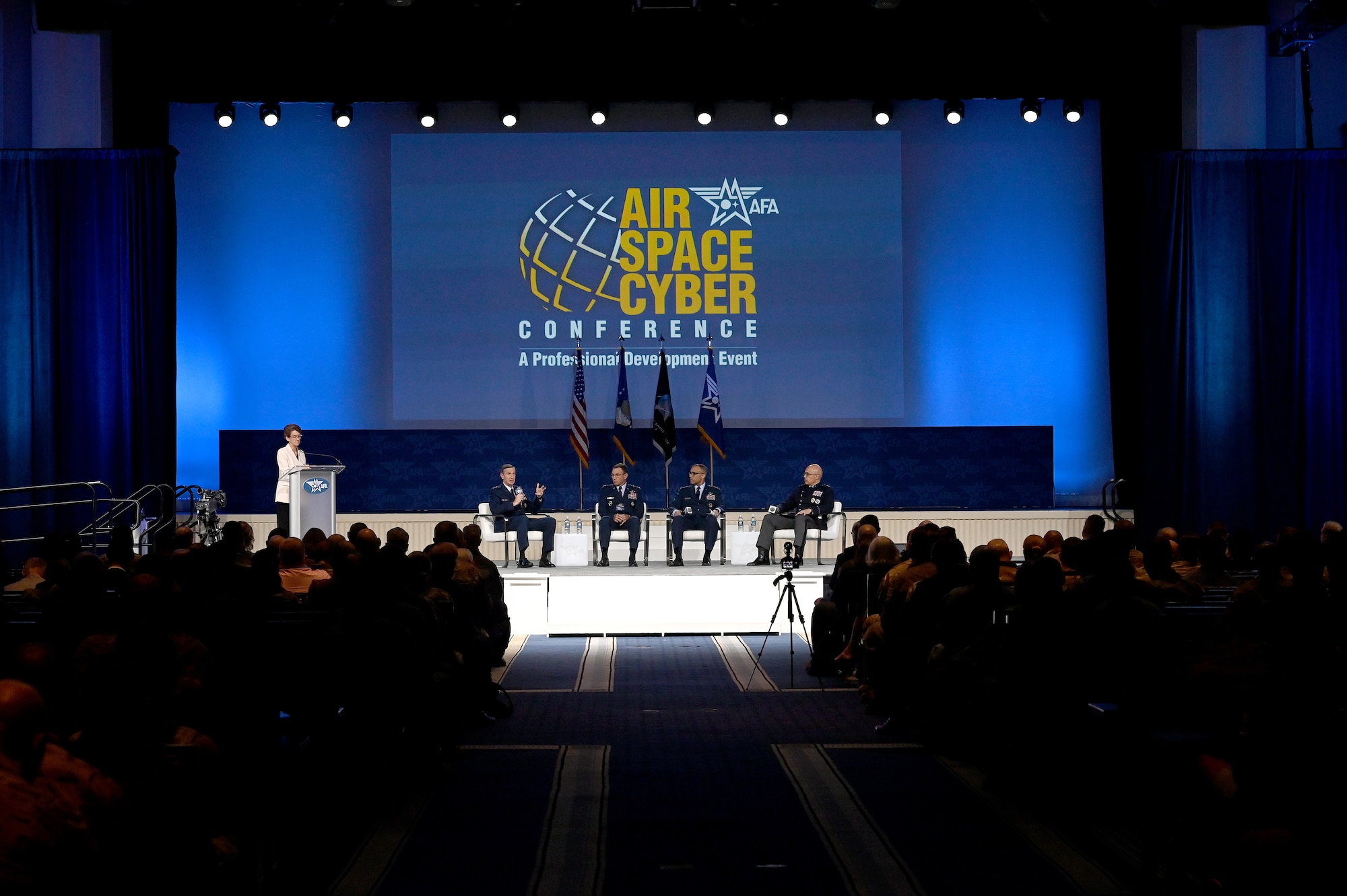 Gen. Kevin Schneider, Gen. Adrian Spain, Gen. John Lamontagne and Lt. Gen. David Miller speaks during the Exercising at Scale panel, at the National Harbor, Md. Sept. 24, 2025.  The Air, Space & Cyber Conference is an opportunity for Department of the Air Force senior leaders to meet and address Airmen, Guardians, allies, partners and industry leaders. (U.S. Air Force photo by Chad Trujillo)