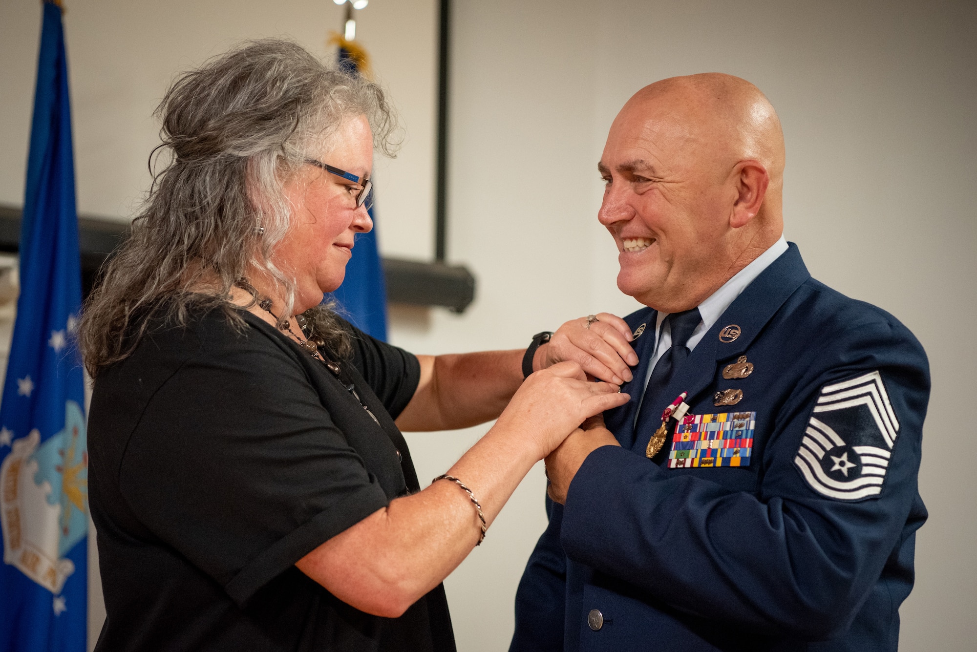 Chief Master Sgt. Chris Tellis, outgoing senior enlisted leader for the 123rd Contingency Response Group, is officially retired from military service during a ceremony at the Kentucky Air National Guard Base in Louisville Ky., June 7, 2025. Tells is retiring after 38 years of military service. (U.S. Air National Guard photo by Master Sgt. Joshua Horton)