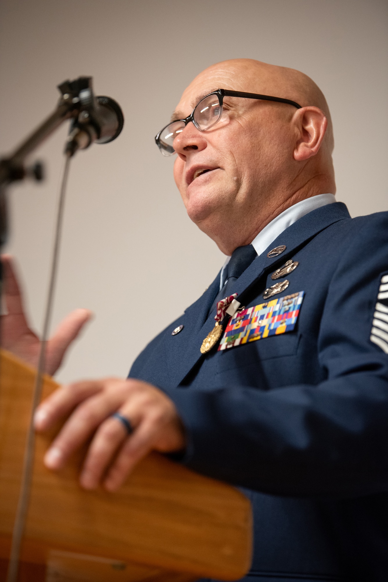 Chief Master Sgt. Chris Tellis, outgoing senior enlisted leader for the 123rd Contingency Response Group, speaks during his retirement ceremony at the Kentucky Air National Guard Base in Louisville, Ky., June 7, 2025. Tells is retiring after 38 years of military service. (U.S. Air National Guard photo by Master Sgt. Joshua Horton)