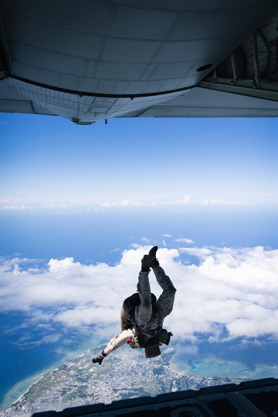 A U.S. Marine with Force Reconnaissance Platoon, Maritime Raid Force, 31st Marine Expeditionary Unit, conducts a freefall jump during parachute operations training over Okinawa, Japan, Sep. 26, 2025. The Marines conducted the training to maintain and improve their parachute insertion skills. The 31st MEU, the Marine Corps’ only continuously forward-deployed MEU, provides a flexible and lethal force ready to perform a wide range of military operations as the premiere crisis response force in the Indo-Pacific region. (U.S. Marine Corps photo by Cpl. Alora Finigan)