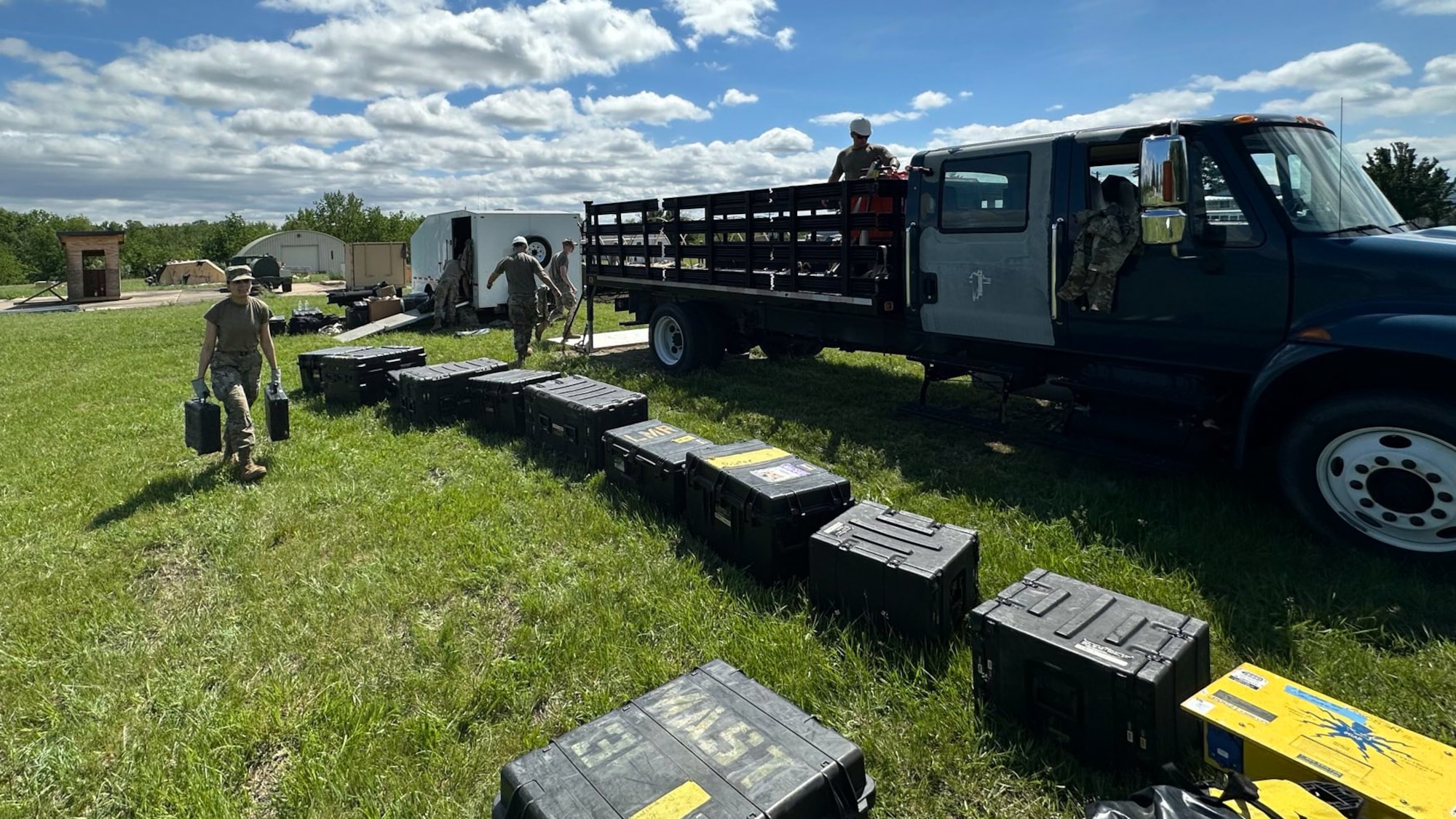 Airmen from the Kentucky Air National Guard’s 123rd Mission Support Group establish operations in Indiantown Gap, Pa., May 22, 2025, as part of Exercise Kentucky Windage 2025. Nearly 70 Airmen deployed for the field exercise to strengthen their Agile Combat Employment skills. (U.S. Air National Guard photo by Master Sgt. Kenneth Soto)