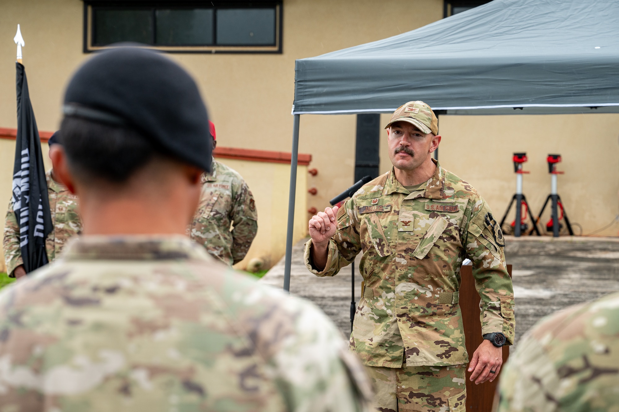 U.S. Air Force Col. Andrew Miller, 36th Contingency Response Group commander, gives a speech during a POW/MIA 24-hour Run at Andersen Air Force Base, Guam.