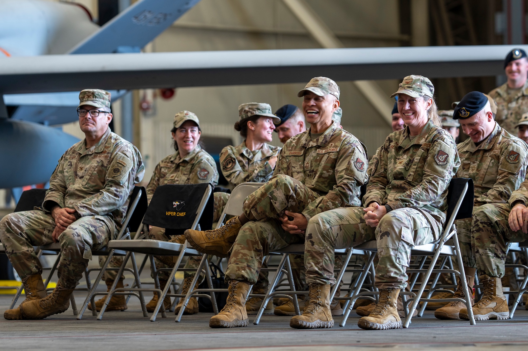 A crowd sits together.