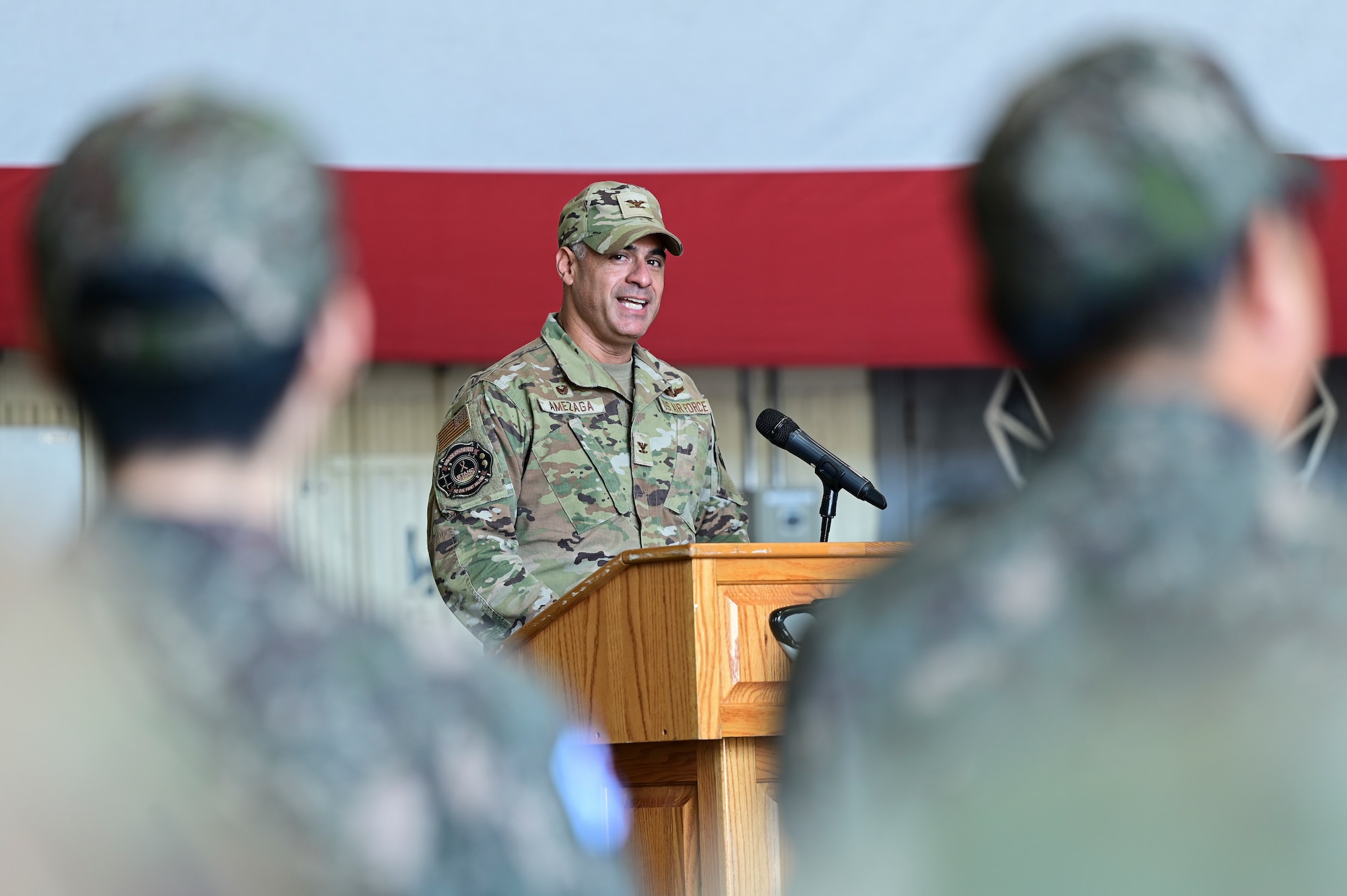 A man stands at a podium.