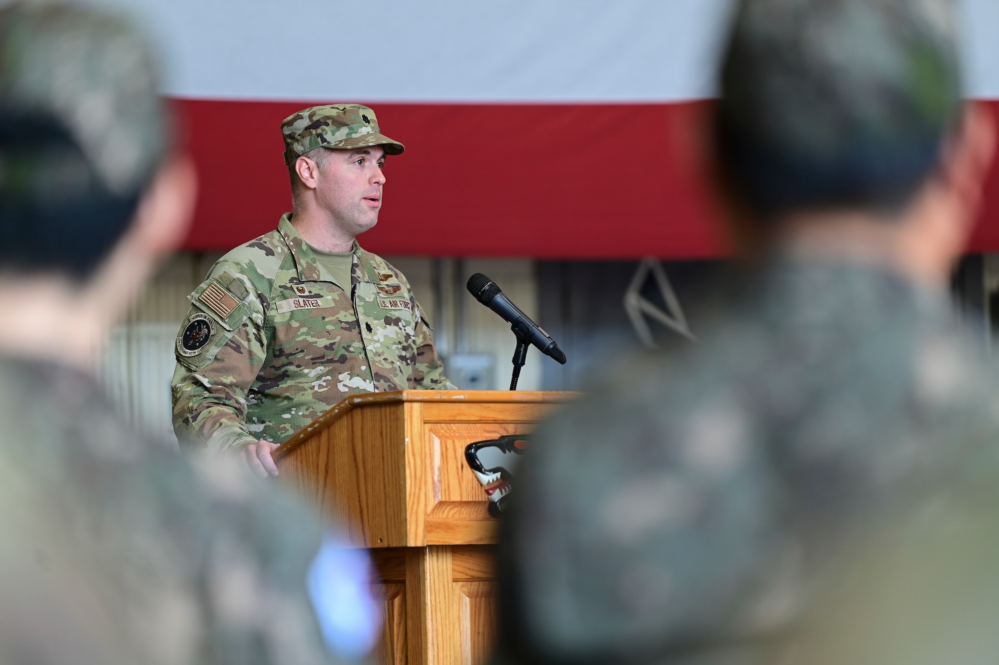 A man stands at a podium.