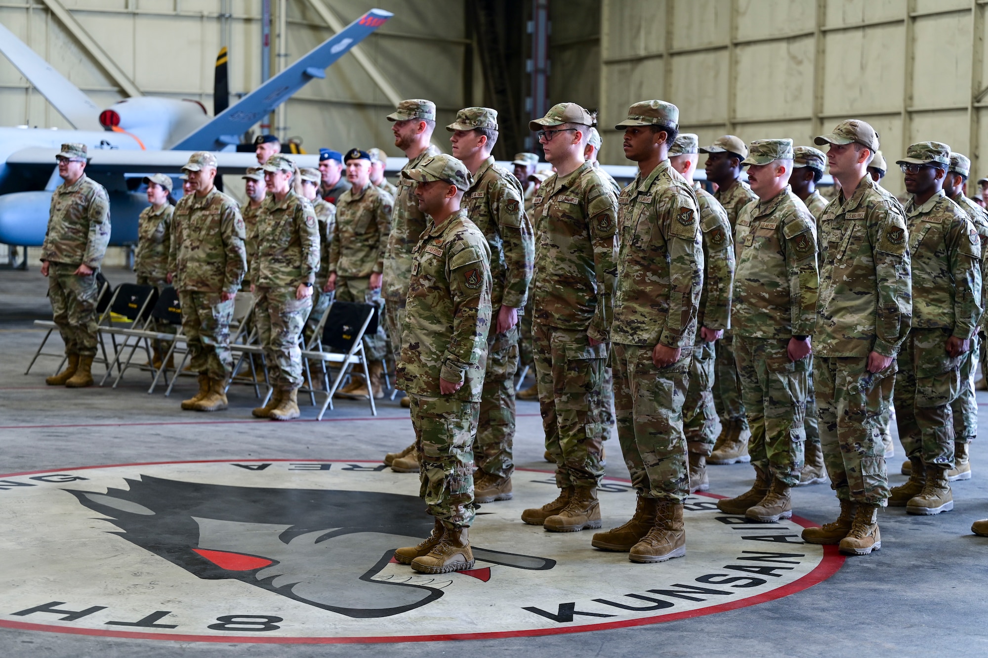 A group stands in formation.