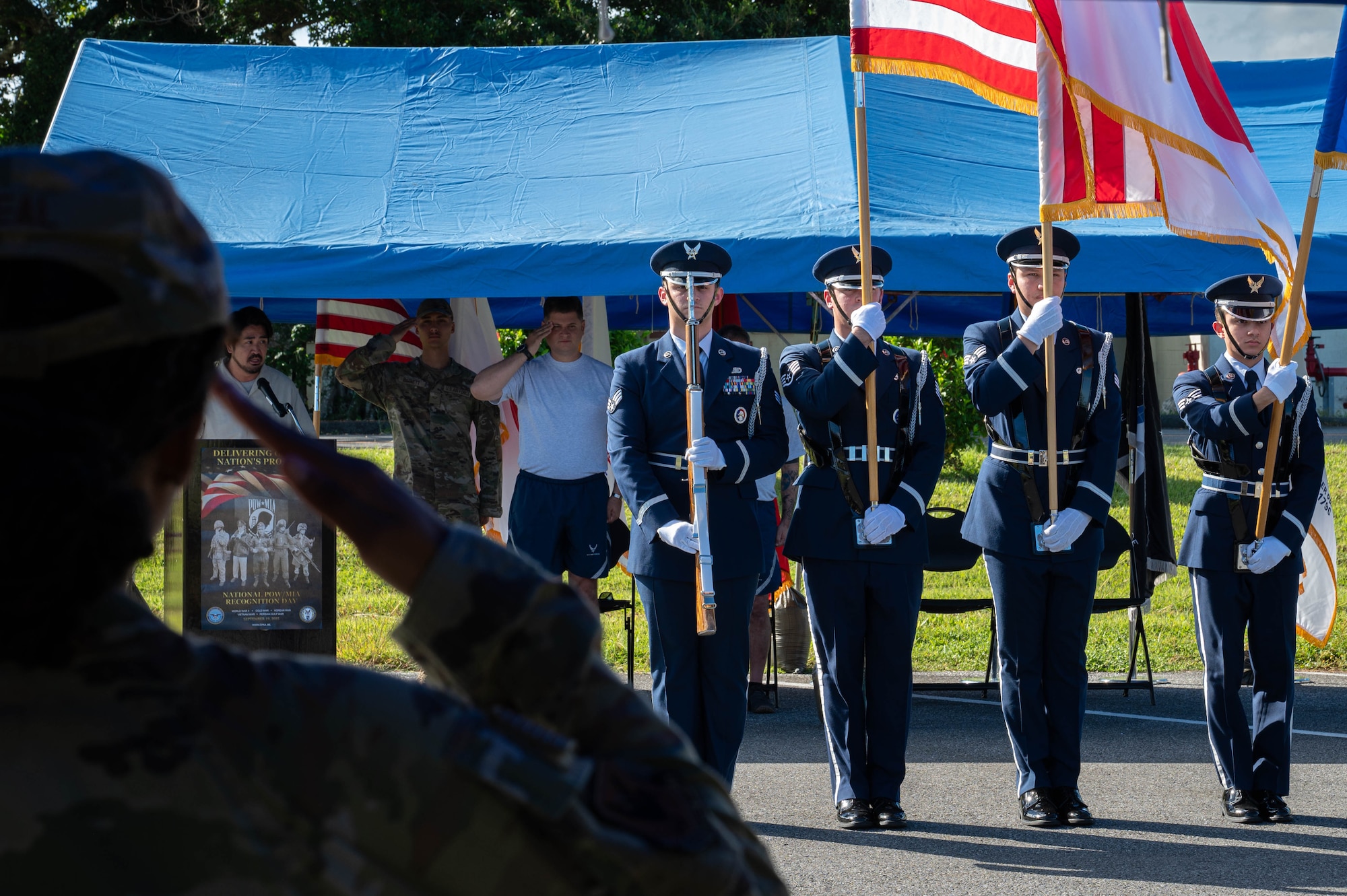 Members of the Kadena Honor Guard present the colors during the opening ceremony of the POW/MIA Remembrance Run 24-hour ruck at Kadena Air Base, Japan, Sept. 18, 2025. POW/MIA Recognition Day remembers and honors U.S. service members who were prisoners of war and those who never returned home. (U.S. Air Force photo by Airman Nathaniel Jackson)