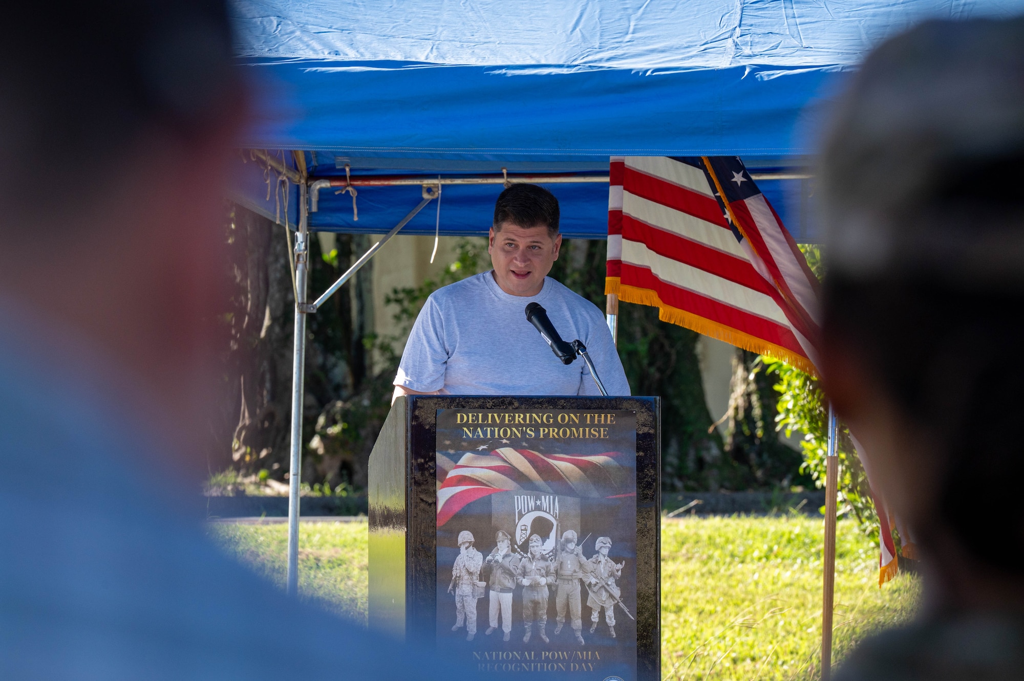 U.S Air Force Col. Gerald Carisio, 18th Maintenance Group commander, delivers a speech during the opening ceremony of the POW/MIA Remembrance Run 24-hour ruck at Kadena Air Base, Japan, Sept. 18, 2025. During his remarks, Carisio reaffirmed the U.S. military’s responsibility to preserve the legacy of prisoners of war and those missing in action, ensuring their sacrifices remain honored and remembered across every generation of service members. (U.S. Air Force photo by Senior Airman Jamal Berry II)