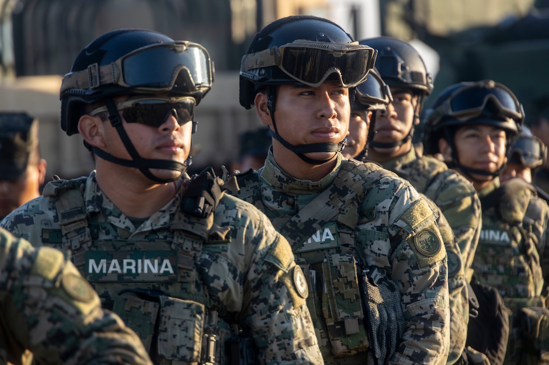 Marines with Cuerpo de Infanteria de Marina Armada de Mexico (Mexican marine corps) prepare to load onto a Landing Craft, Air Cushion assigned to the USS Arlington (LPD 24) during beach operations group support as part of exercise UNITAS 2025 at Marine Corps Base Camp Lejeune, North Carolina, Sept. 25, 2025. UNITAS, which is Latin for “unity,” was conceived in 1959 and has taken place annually since first conducted in 1960. This marks the 66th iteration of the world’s longest running annual multinational maritime exercise. (U.S. Marine Corps photo by Lance Cpl. Isabella Ramos)