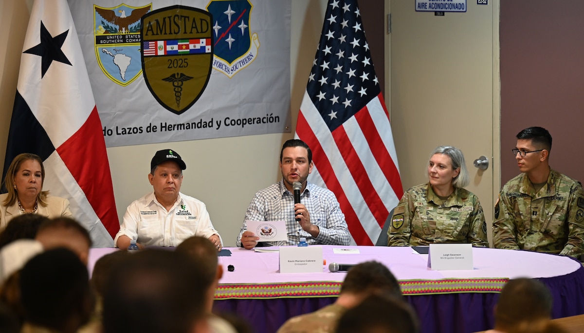 Image of a group talking at a table.