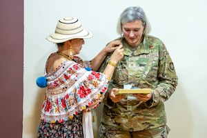 Image of two people in a photo.