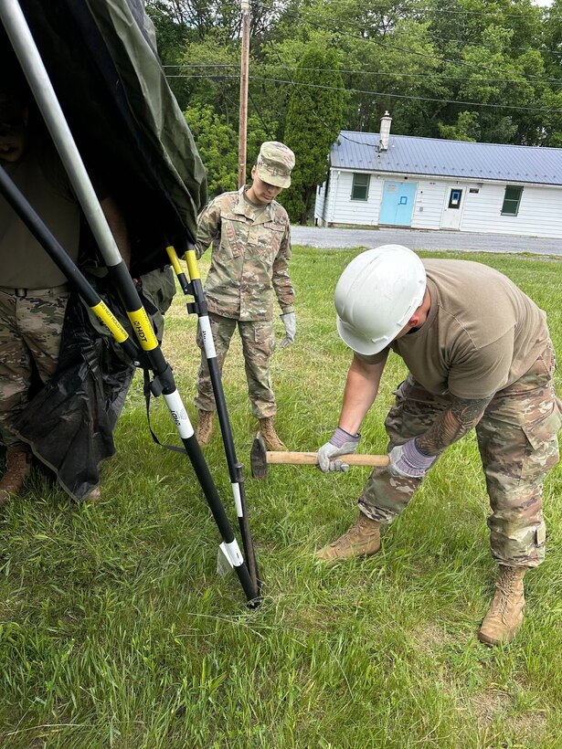Airmen from the Kentucky Air National Guard’s 123rd Mission Support Group erect tent frames in Indiantown Gap, Pa., May 22, 2025, as part of Exercise Kentucky Windage 2025.