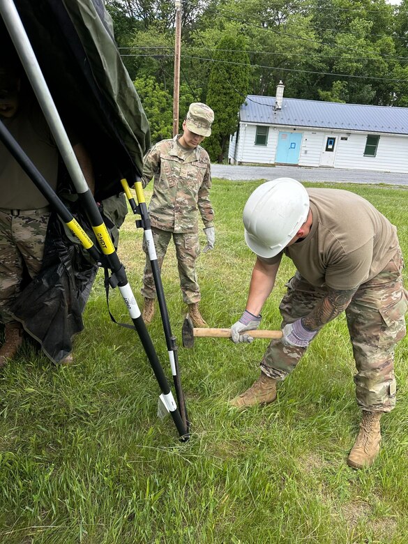 Airmen from the Kentucky Air National Guard’s 123rd Mission Support Group erect tent frames in Indiantown Gap, Pa., May 22, 2025, as part of Exercise Kentucky Windage 2025.