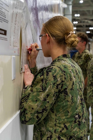 MAGNA, Utah - Six Sailors were given a rare opportunity to peek behind the curtain of the development of the most lethal, accurate, and reliable sea-based strategic deterrent on the planet during a Reverse Strategic Weapons System (SWS) Week at Strategic Systems Programs (SSP) Program Management Office (PMO) Flight Systems’ (SPF) detachment site in Magna, Utah (SPF(B)), August 17-21.  



Reverse SWS Weeks invite ballistic missile submarine (SSBN) crew members to SSP’s PMOs and detachments – dispersed throughout the nation – to give them an exclusive behind-the-scenes look at the weapons system they maintain and operate while on strategic patrol. The newly established Reverse SWS Week is accelerating understanding of the weapon system for the Sailors.    



The submarine-launched ballistic missile (SLBM) Trident II D5 SWS is the most lethal, accurate, and reliable sea-based strategic deterrent on the planet. The U.S. Navy entrusts its premier weapons system to the enlisted servicemen and women aboard the Navy’s SSBNs. These young Sailors maintain, operate, and even sleep next to these missiles, all while keeping the weapons at the highest standard of readiness. 



Each of the six Sailors expressed that they came away from the week with increased knowledge and enthusiasm for their roles, and for the Navy’s strategic deterrence mission.   



(U.S. Navy Photo Courtesy of Northrop Grumman/Released)