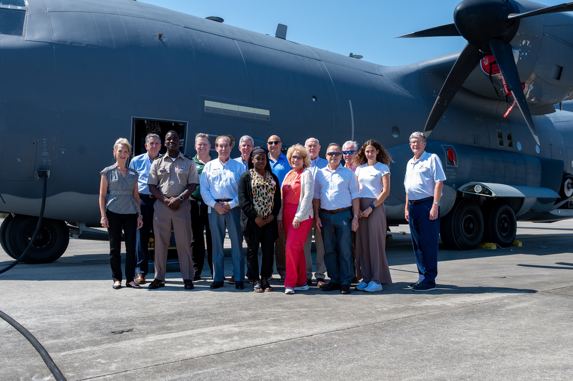 The FDSC pose for a photo in front of an AC-130J Ghostrider gunship.