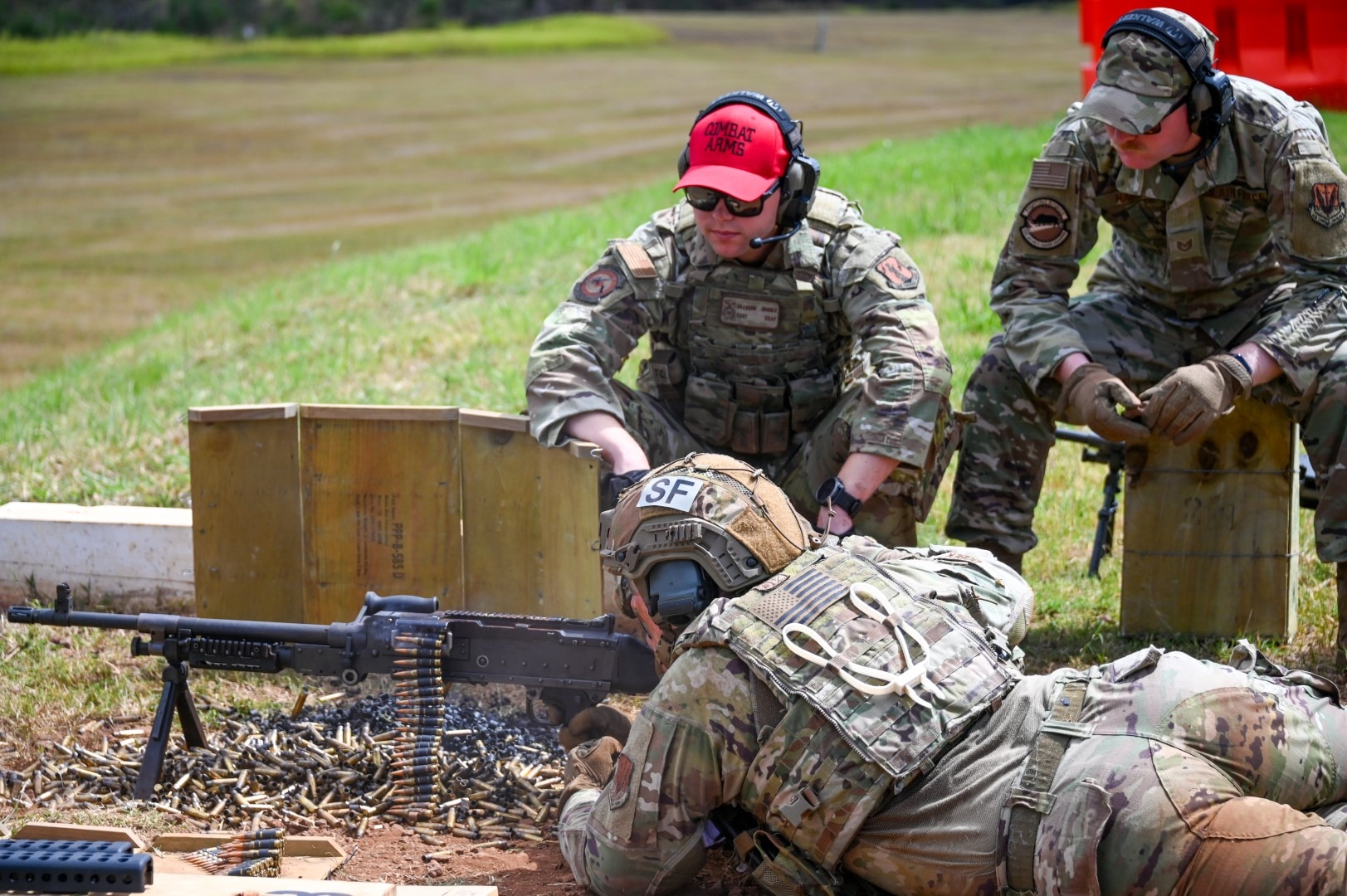 Airmen from the 132d and 647th Security Forces Squadron shoot side by side at a machine gun range for qualification at Schofield Barracks, HI on Aug 23, 2025.