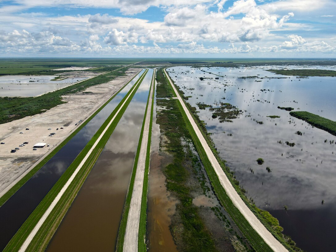 An aerial photo of the Everglades Agricultural Area (EAA) Contract 10. It is the 8-mile inflow/outflow canal (3,000 CFS) and 7-mile seepage canal / maintenance road (Northern Boundary of Reservoir).
The EAA is part of the Central Everglades Planning Project (CEPP) and the Comprehensive Everglades Restoration Plan (CERP). The project will set the foundation for restoring the central portion of the Everglades ecosystem and sending additional water south. CEPP EAA will capture water lost to tide and re-direct water flow south to the central Everglades, Everglades National Park, and Florida Bay. (U.S. Army Photo by Mark Rankin)