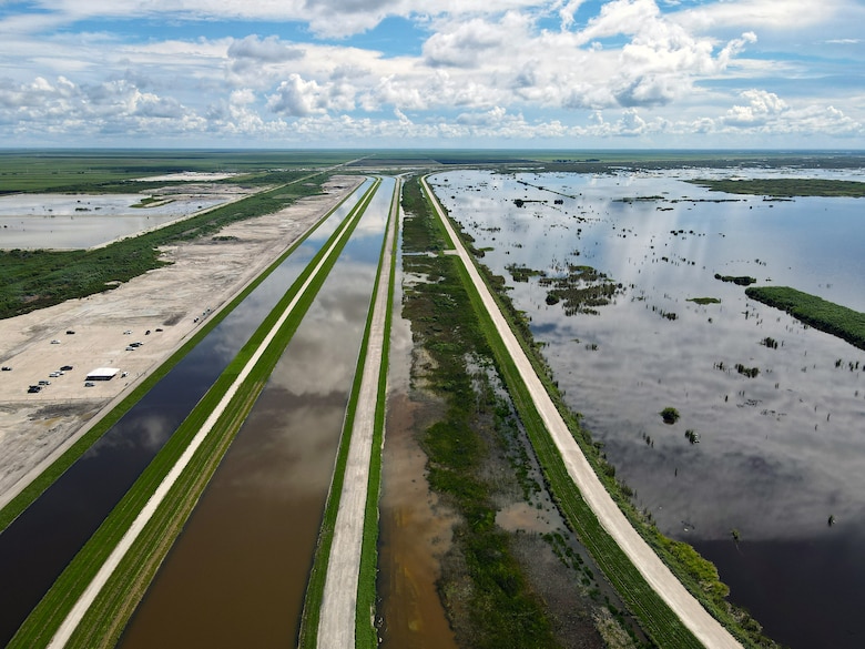 An aerial photo of the Everglades Agricultural Area (EAA) Contract 10. It is the 8-mile inflow/outflow canal (3,000 CFS) and 7-mile seepage canal / maintenance road (Northern Boundary of Reservoir).
The EAA is part of the Central Everglades Planning Project (CEPP) and the Comprehensive Everglades Restoration Plan (CERP). The project will set the foundation for restoring the central portion of the Everglades ecosystem and sending additional water south. CEPP EAA will capture water lost to tide and re-direct water flow south to the central Everglades, Everglades National Park, and Florida Bay. (U.S. Army Photo by Mark Rankin)
