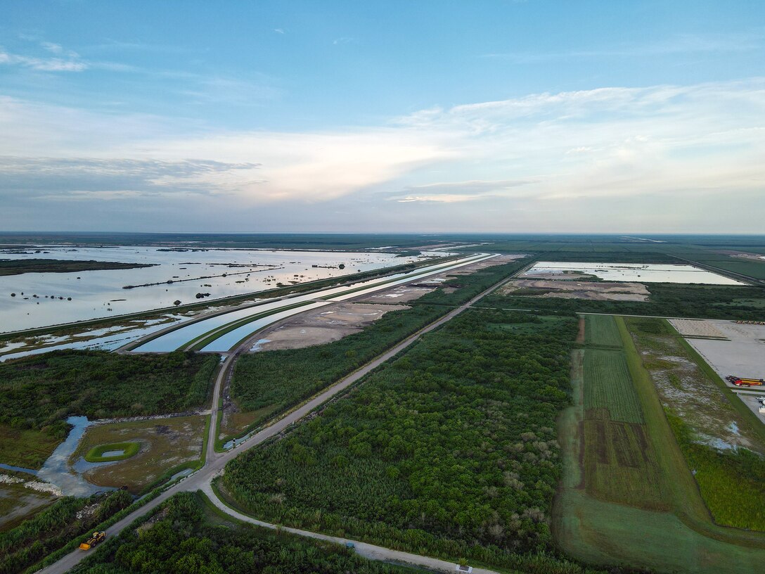 An aerial photo of the Everglades Agricultural Area (EAA) Contract 10. It is the 8-mile inflow/outflow canal (3,000 CFS) and 7-mile seepage canal / maintenance road (Northern Boundary of Reservoir).
The EAA is part of the Central Everglades Planning Project (CEPP) and the Comprehensive Everglades Restoration Plan (CERP). The project will set the foundation for restoring the central portion of the Everglades ecosystem and sending additional water south. CEPP EAA will capture water lost to tide and re-direct water flow south to the central Everglades, Everglades National Park, and Florida Bay. (U.S. Army Photo by Mark Rankin)