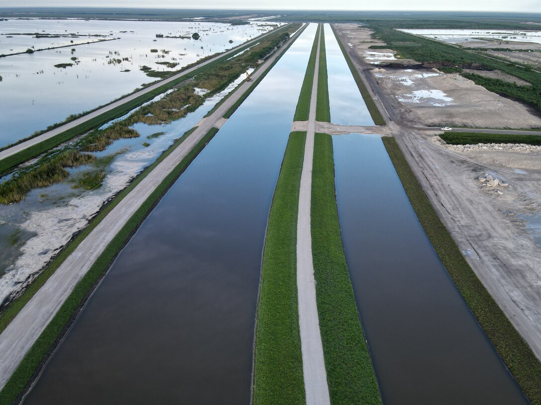An aerial photo of the Everglades Agricultural Area (EAA) Contract 10. It is the 8-mile inflow/outflow canal (3,000 CFS) and 7-mile seepage canal / maintenance road (Northern Boundary of Reservoir).
The EAA is part of the Central Everglades Planning Project (CEPP) and the Comprehensive Everglades Restoration Plan (CERP). The project will set the foundation for restoring the central portion of the Everglades ecosystem and sending additional water south. CEPP EAA will capture water lost to tide and re-direct water flow south to the central Everglades, Everglades National Park, and Florida Bay. (U.S. Army Photo by Mark Rankin)